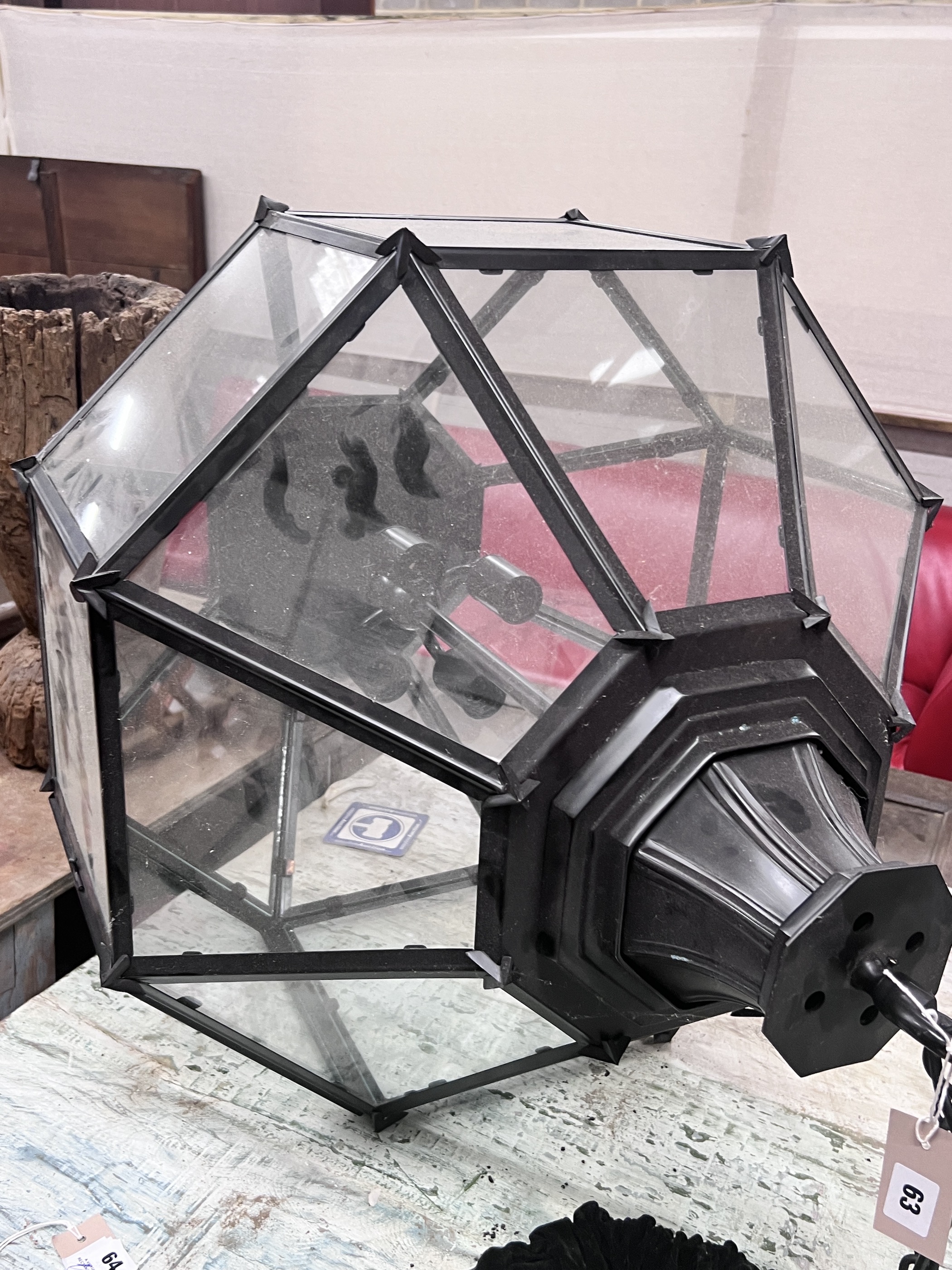 A pair of contemporary octagonal glazed metal hall lanterns, height 96cm